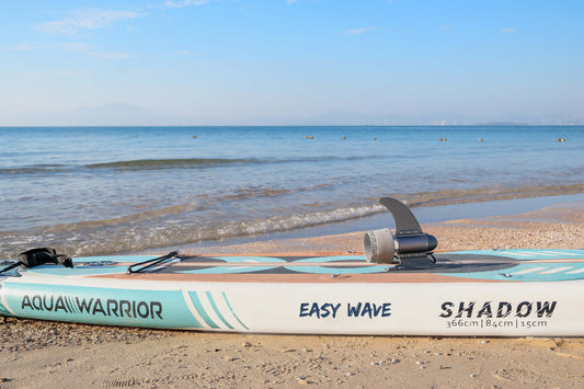 Easywaver Y02 motor with paddle board Lying on the beach with blue sky